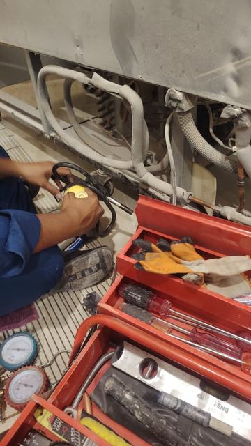 Refrigerator service with gauges and tools
